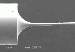Figure 1: High aspect ratio (of up to 200) micro shaft manufactured by micro turning.
